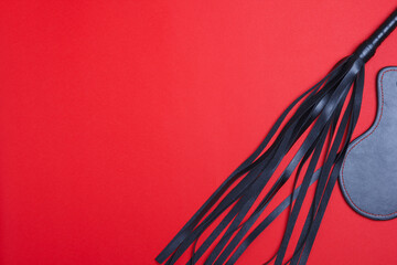 Whip and mask for role-playing BDSM games. Sex shop fun for punishment, spank passionately with...