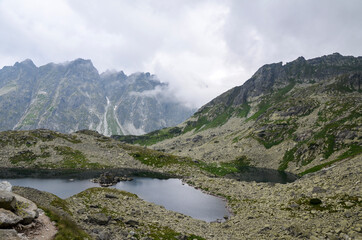 Fototapeta na wymiar Scenic view of mountain lake Zabie pleso located near Rysy peak in High Tatras mountains, Slovakia