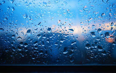Raindrops on window with bottom border