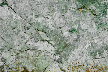 Texture of a concrete wall with cracks and scratches which can be used as a background