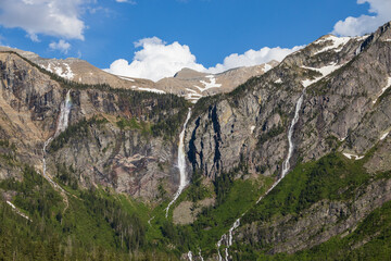 Fototapeta na wymiar Mountain range surrounding Avalanche Lake at Glacier National Park