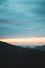 Obraz na płótnie Canvas Sunset over the Basque Country coast on a cloudy day
