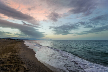 Sea shore purple blueish colorful sky dusk vawes
