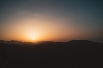 Silhouettes of mountains during a sunset in Basque Country