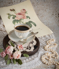 Romantic still life with coffee and roses