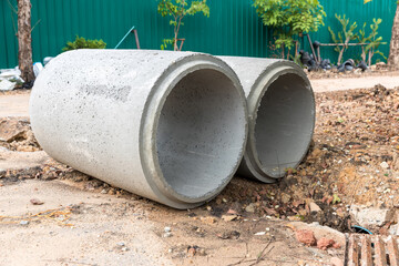 Concrete Drainage Pipe on a Construction Site.  Concrete drainage pipes stacked for construction....