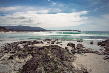 The Pacific Ocean coast in the city of Monterey in California. United States of America. Beautiful beach on a sunny day. Ocean landscape.
