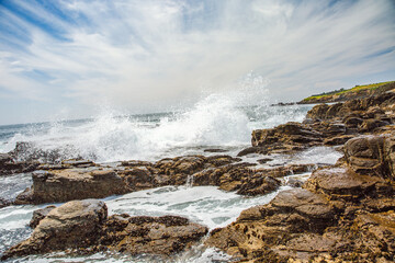 The Pacific Ocean coast in the city of Monterey in California. United States of America. Beautiful beach on a sunny day. Ocean landscape.