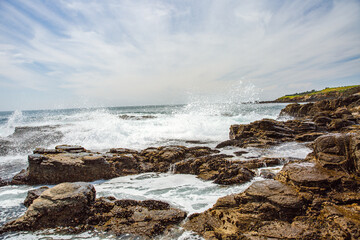 The Pacific Ocean coast in the city of Monterey in California. United States of America. Beautiful beach on a sunny day. Ocean landscape.
