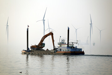 Construction of new wind turbines at the Ijsselmeer, Breezanddijk, Holland - 429665883