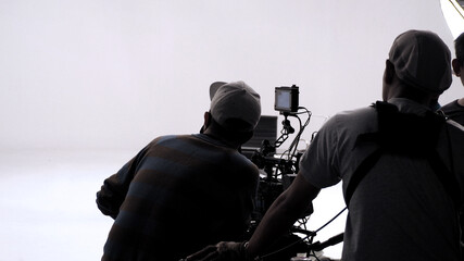 Silhouette images of video production behind the scenes. making of TV commercial movie that film...