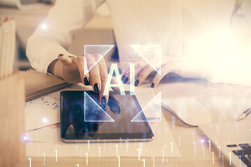 Double exposure of technology sketch hologram and woman holding and using a mobile device. Ai...