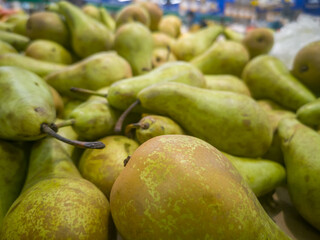 selling pears in a grocery supermarket close up