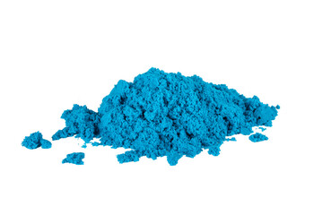 A pile of blue kinetic sand on a white background