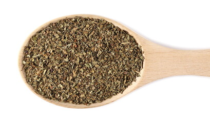 Basil dried spice in wooden spoon isolated on white background, top view