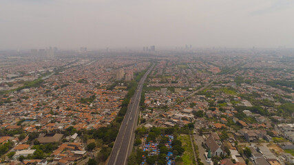 Aerial cityscape modern city Surabaya with skyscrapers, buildings and houses. city skyline with skyscrapers and business centers Surabaya capital city east java, indonesia