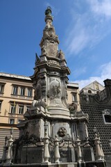 Fototapeta na wymiar Monument Guglia dell'Immacolata at Piazza del Gesù Nuovo in Naples, Italy 