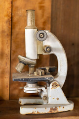 Old and rusty microscope