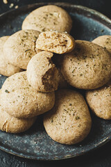 Whole grain almond cookies on a plate.