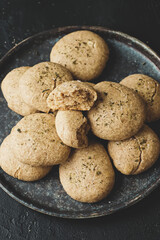 Whole grain almond cookies on a plate.