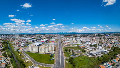 Deputado João Leopoldo Jacomel Highway (PR 415), entrance to Pinhais, the smallest municipality in the state of Paraná. Drone image on the border with Curitiba, capital of the state.
