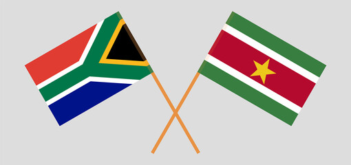 Crossed flags of Republic of South Africa and Suriname. Official colors. Correct proportion