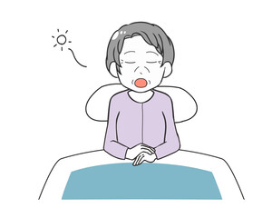 寝室　あくび　高齢女性