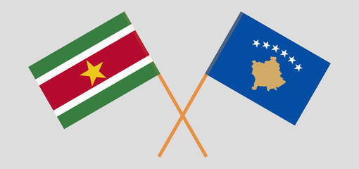 Crossed flags of Suriname and Kosovo. Official colors. Correct proportion