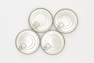 Iron cans of canned food on a white background