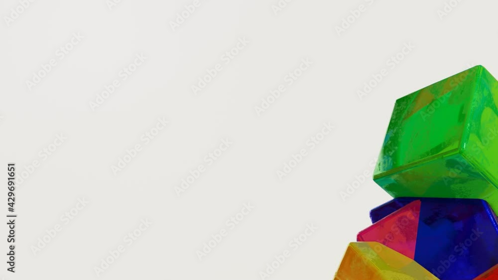 Poster several bright multi-colored cubes are slowly moving on a white background. looped animated backgrou