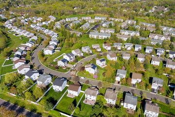 Aerial view of residential houses neighborhood complex at suburban housing development