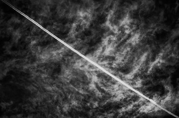black and white sky jet trail