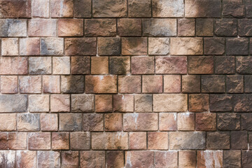 Fototapeta premium Wet colorful brick wall background texture.