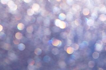 Obraz premium bright glitter background: bokeh effect from many colored lights on frozen glass, toning