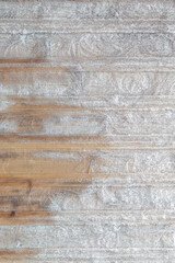 winter frosty background: boards covered with snowflakes and hoarfrost, ice patterns, wood texture, close, toning