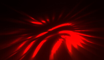 Light particles in motion, creating a burst of glowing multicolored rays on a black background. Energetic glow lights wallpaper.