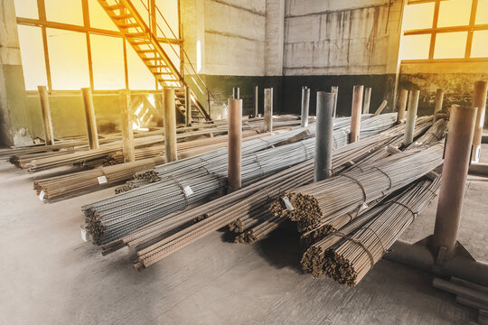 Storage of rebar or iron building materials in a warehouse or production hall of an industrial enterprise