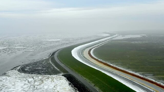 Fields and North Sea in Winter, Nes, Friesland, Netherlands