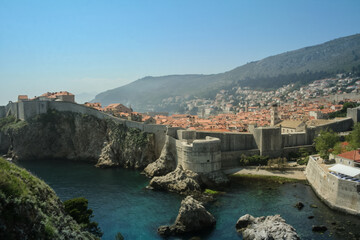 Great Walls of the Old town of Dubrovnik, Croatia, seen from above with the Adriatic see in the background. The place is one of the major hotspots for Croatian tourism