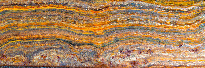 grunge background: curly rust on an old metal surface, toning