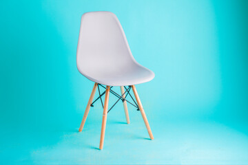 modern gray chair isolated on blue background 