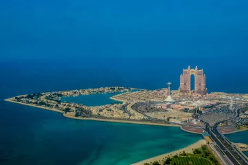 Tuinposter Abu Dhabi Bird's eye and aerial drone view of Abu Dhabi city from observation deck