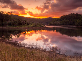 Dramatic Lakeside Sunset with Reflections