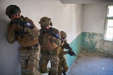 modern warfare soldiers ascent stairs in combat
