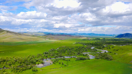 Fototapeta na wymiar Aerial view of the Charysh river valley overlooking the mountain ridge, Altai photo by drone