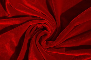 Texture of crumpled velvet fabric that shines in the sun
