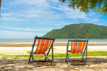 White Sandy Beach of Laem Sala beach which is Flanked On Three Sides By Dry Limestone Hills, Thailand.
