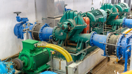Electric motors driving water pumps of water system.