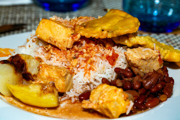 boiled rice with red kidney beans, tofu, fried fish and chicken