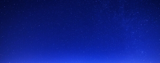 Dark blue night starry sky. Starry background. Galaxy stars. Night sky gradient.